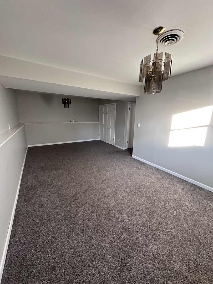 100 West 3rd Street Sublette, IL 61367 - Photo 7 of 18 a view of a room with a window