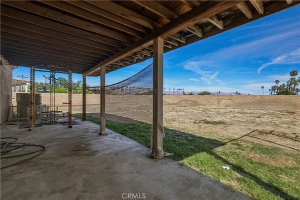 a view of a backyard of the house