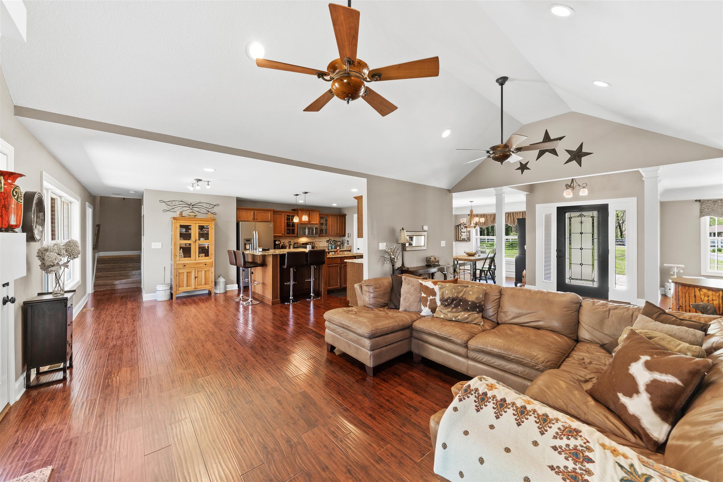 768 Gholson Road Clarksville, TN 37043 - Photo 8 of 29 a living room with furniture kitchen view and a wooden floor