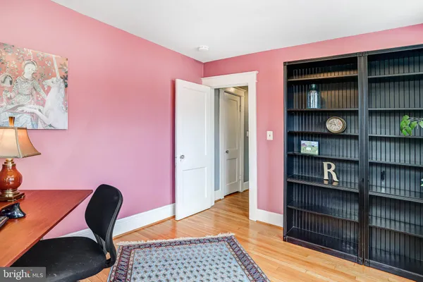 a view of a livingroom with a bookshelf
