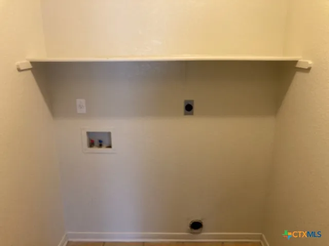 a bathroom with a sink toilet and a mirror