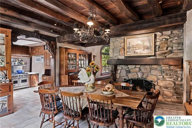 a kitchen with stainless steel appliances a stove and a refrigerator