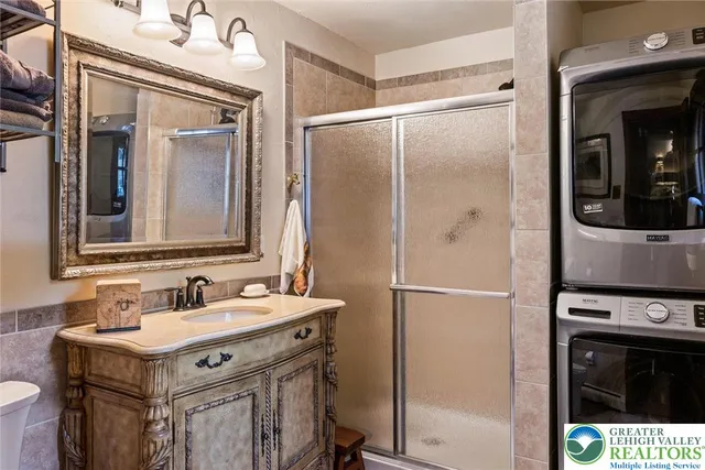 a bathroom with a sink a vanity and a mirror