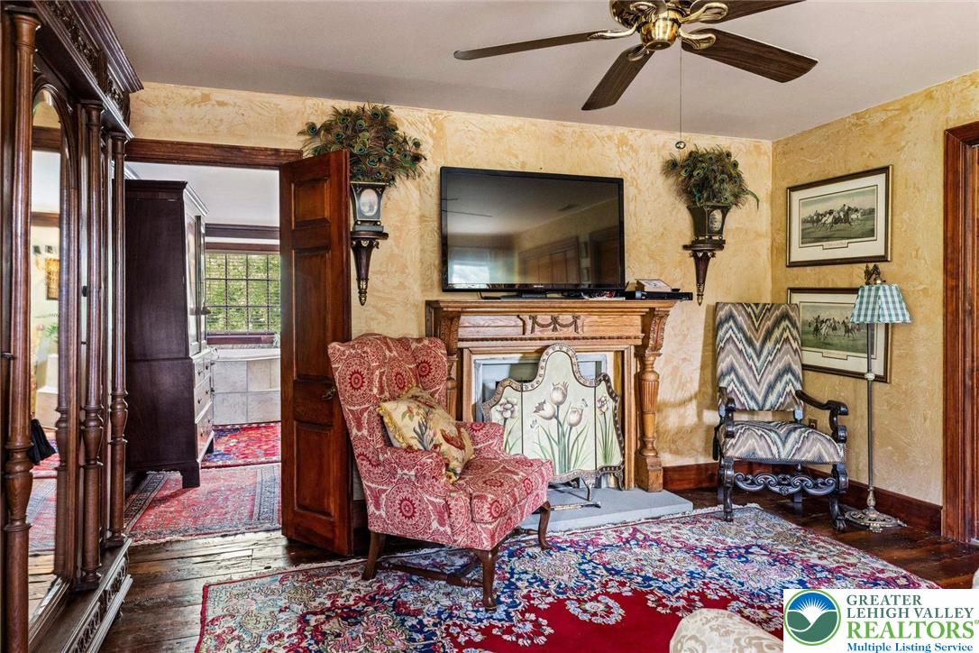 3791 Hunter Road Kintnersville, PA 18930 - Photo 29 of 55 a living room with furniture and a flat screen tv