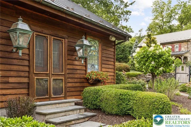 a view of a house with a swimming pool