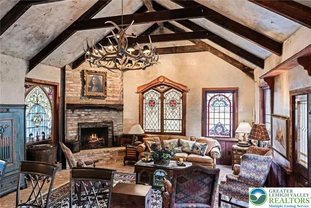 a kitchen with stainless steel appliances granite countertop a refrigerator a sink and a stove