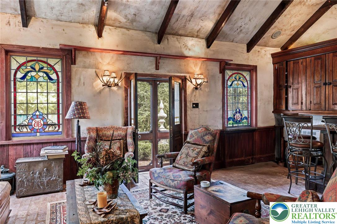 3791 Hunter Road Kintnersville, PA 18930 - Photo 42 of 55 a living room filled with furniture and a window