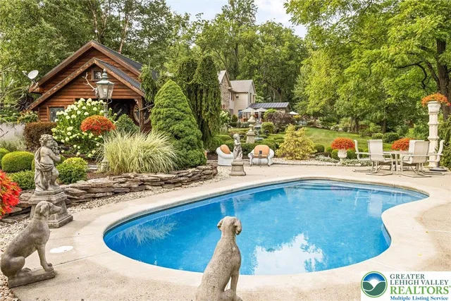 a bedroom with a bed and a table