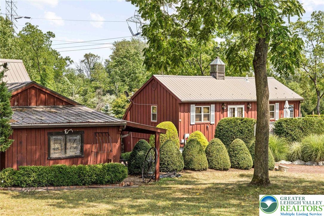 3791 Hunter Road Kintnersville, PA 18930 - Photo 45 of 55 a view of a house with a swimming pool