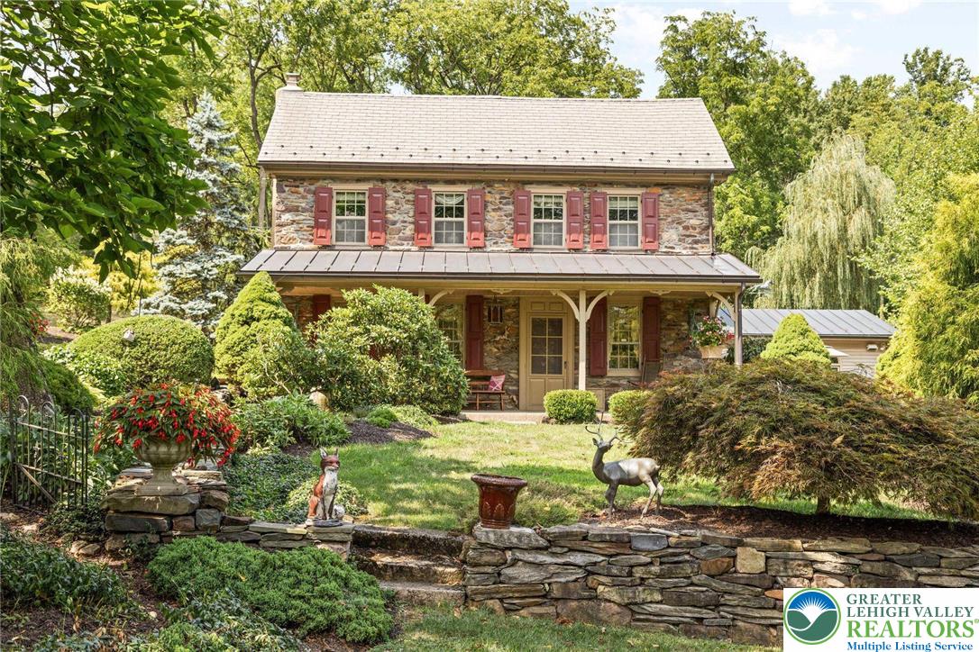 3791 Hunter Road Kintnersville, PA 18930 - Photo 9 of 55 a view of a house with garden and swimming pool