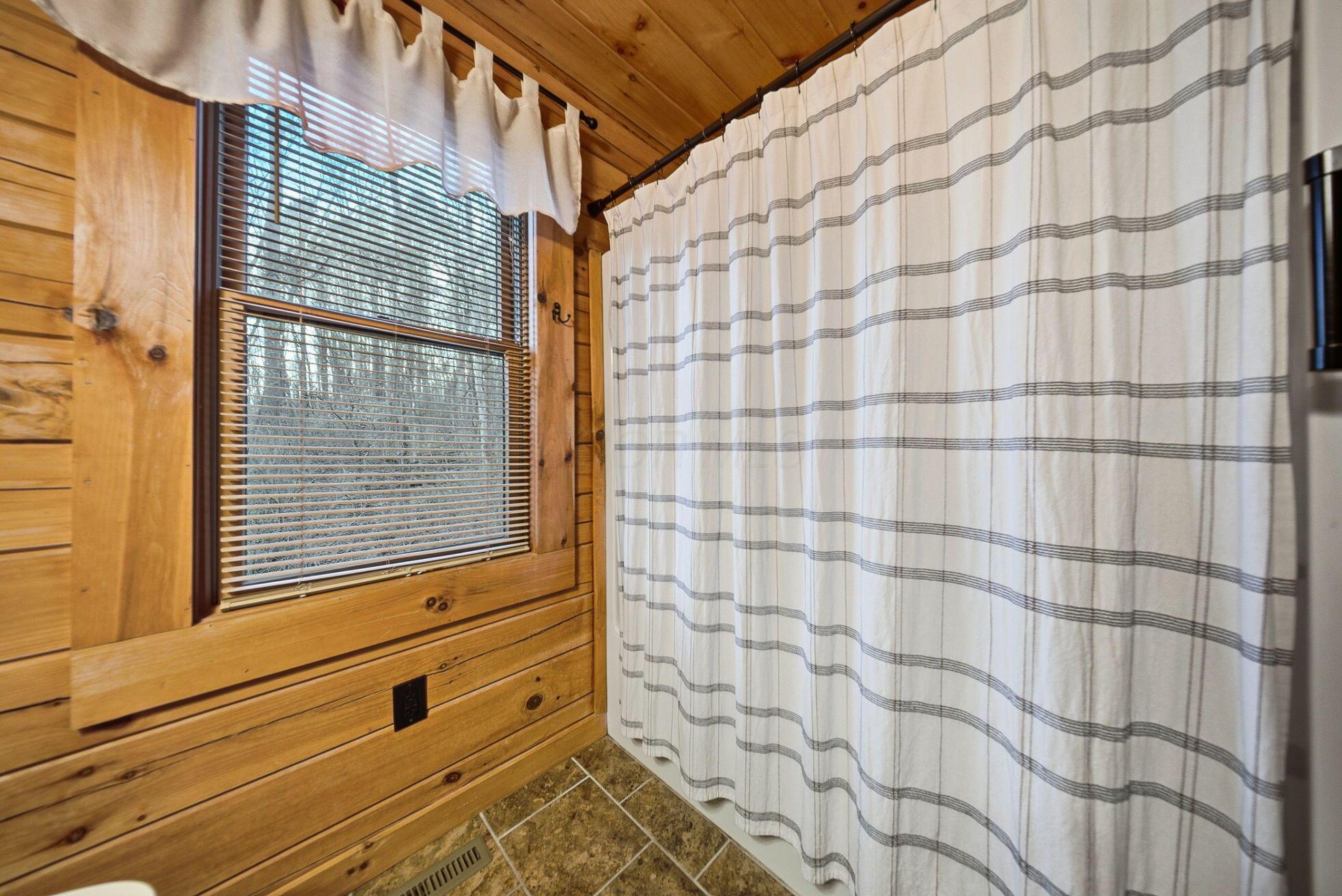 15399 Clapper Hollow Road Laurelville, OH 43135 - Photo 24 of 61 Main Level Full Bathroom adjacent to Kitchen with Granite Countertop Vanity and Shower with Tub