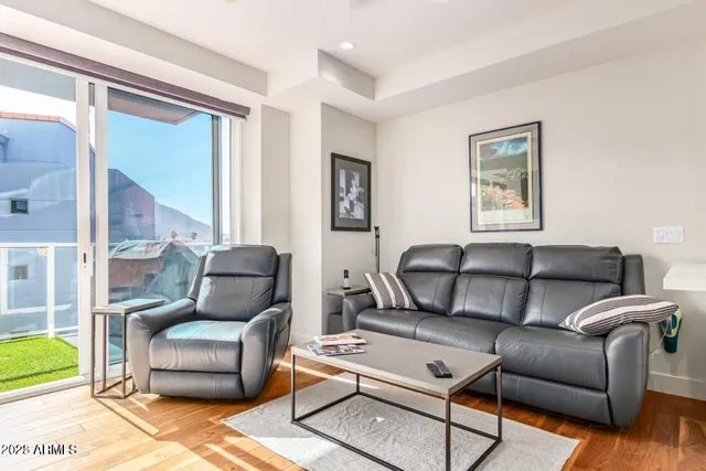 a living room with furniture and a couch