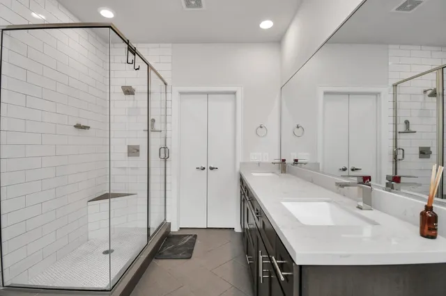 a bathroom with a sink and mirror