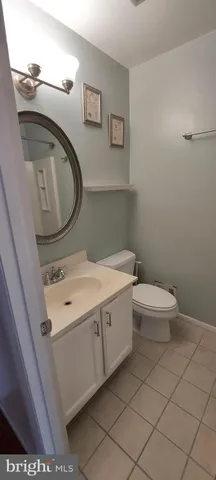 a bathroom with a toilet and a sink