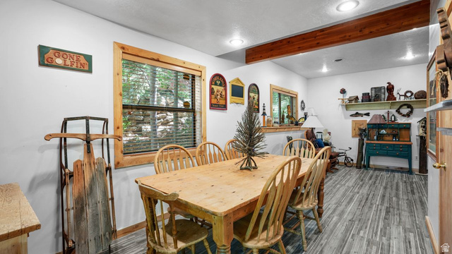 335 Jungfrau Hill Road Midway, UT 84049 - Photo 33 of 34 Dining room featuring wood finished floors, recessed lighting, and beamed ceiling