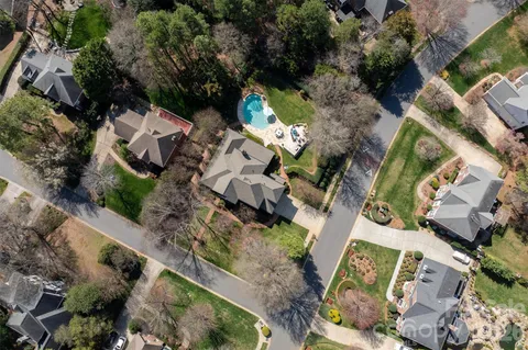 an aerial view of residential house with outdoor space