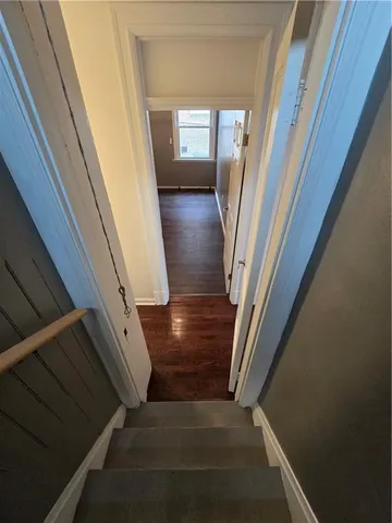 a view of a parking space in front of a building