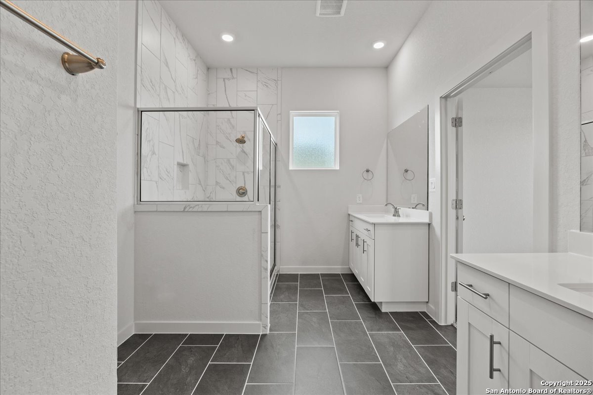 2130 Shepards Street Seguin, TX 78155 - Photo 11 of 21 a bathroom with a shower and a sink