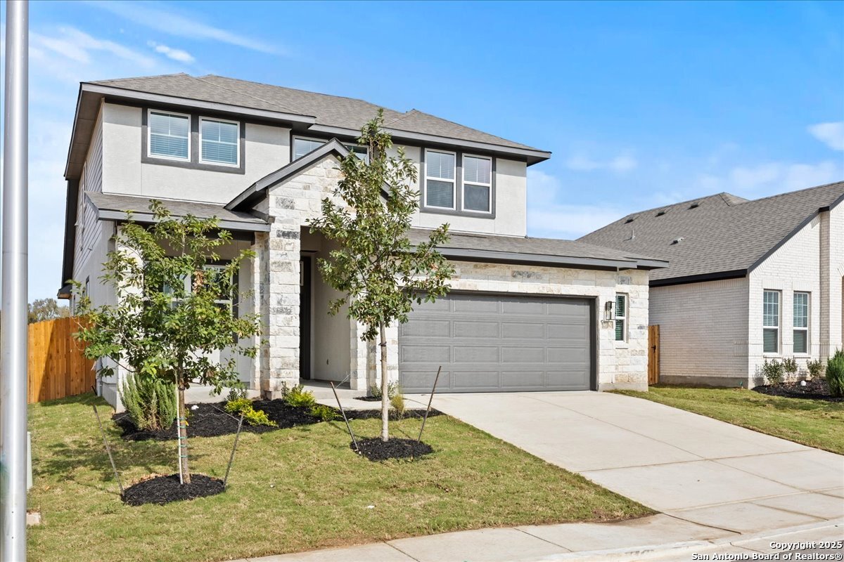 2130 Shepards Street Seguin, TX 78155 - Photo 2 of 21 a front view of a house with garden