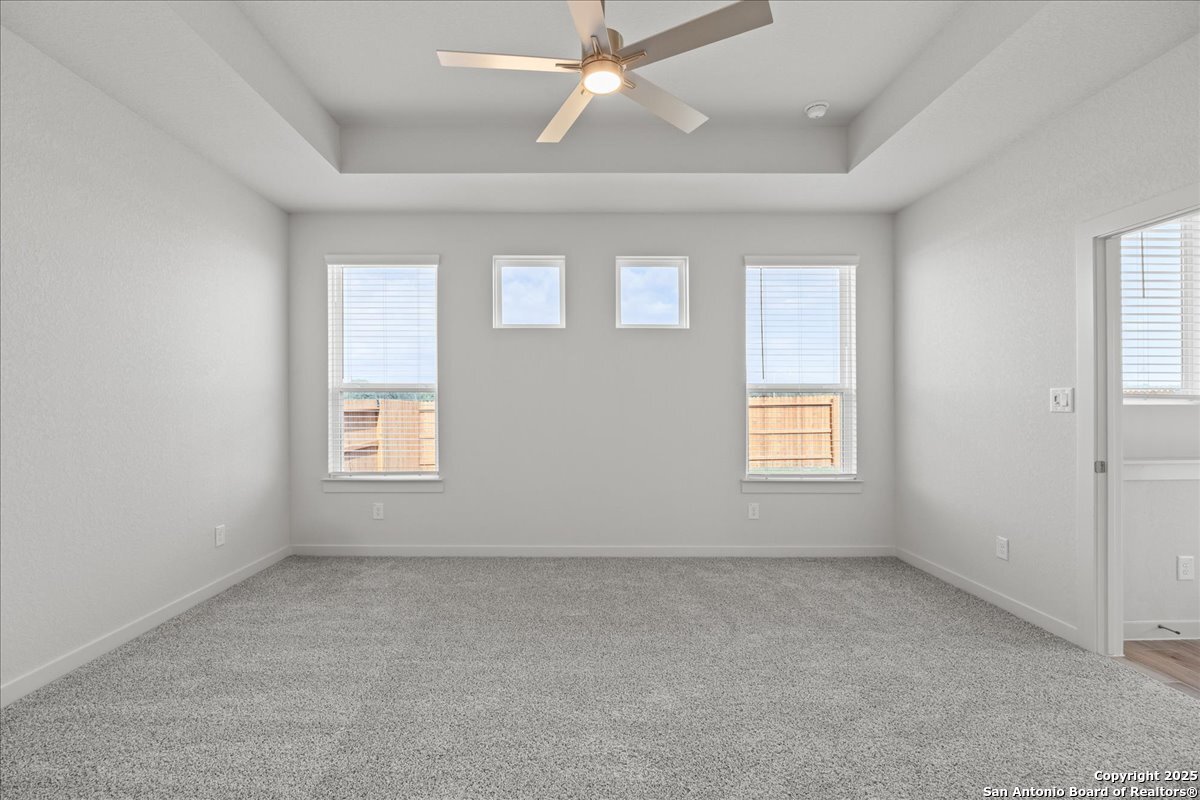 2130 Shepards Street Seguin, TX 78155 - Photo 10 of 21 an empty room with a window and a ceiling fan