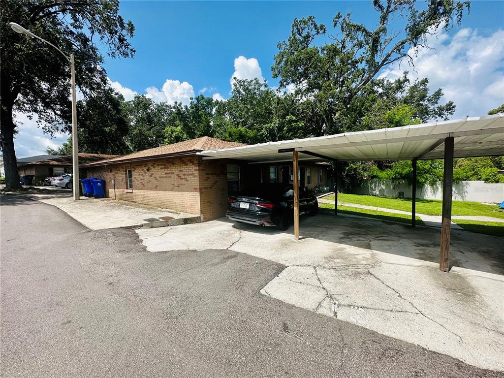 101 Lake Hunter Drive, Unit 15 Lakeland, FL 33803 - Photo 6 of 11 a view of a house with a yard