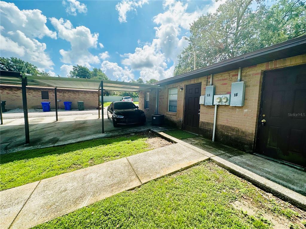 101 Lake Hunter Drive, Unit 15 Lakeland, FL 33803 - Photo 9 of 11 a house view with backyard space