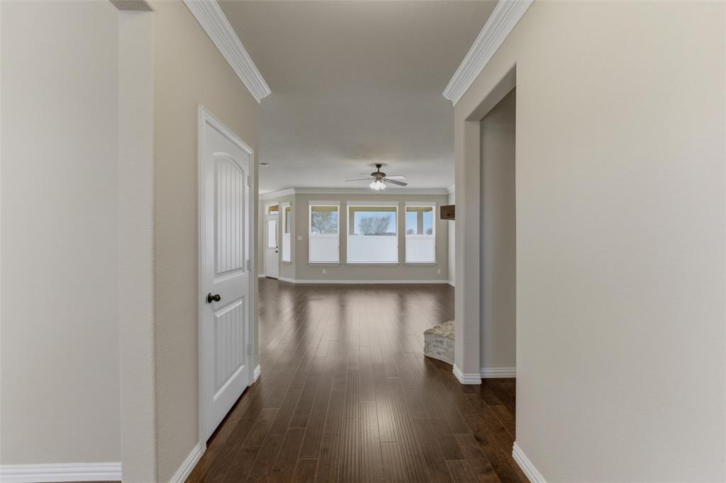 7437 Aniston Way Godley, TX 76044 - Photo 4 of 23 a view of entryway with wooden floor