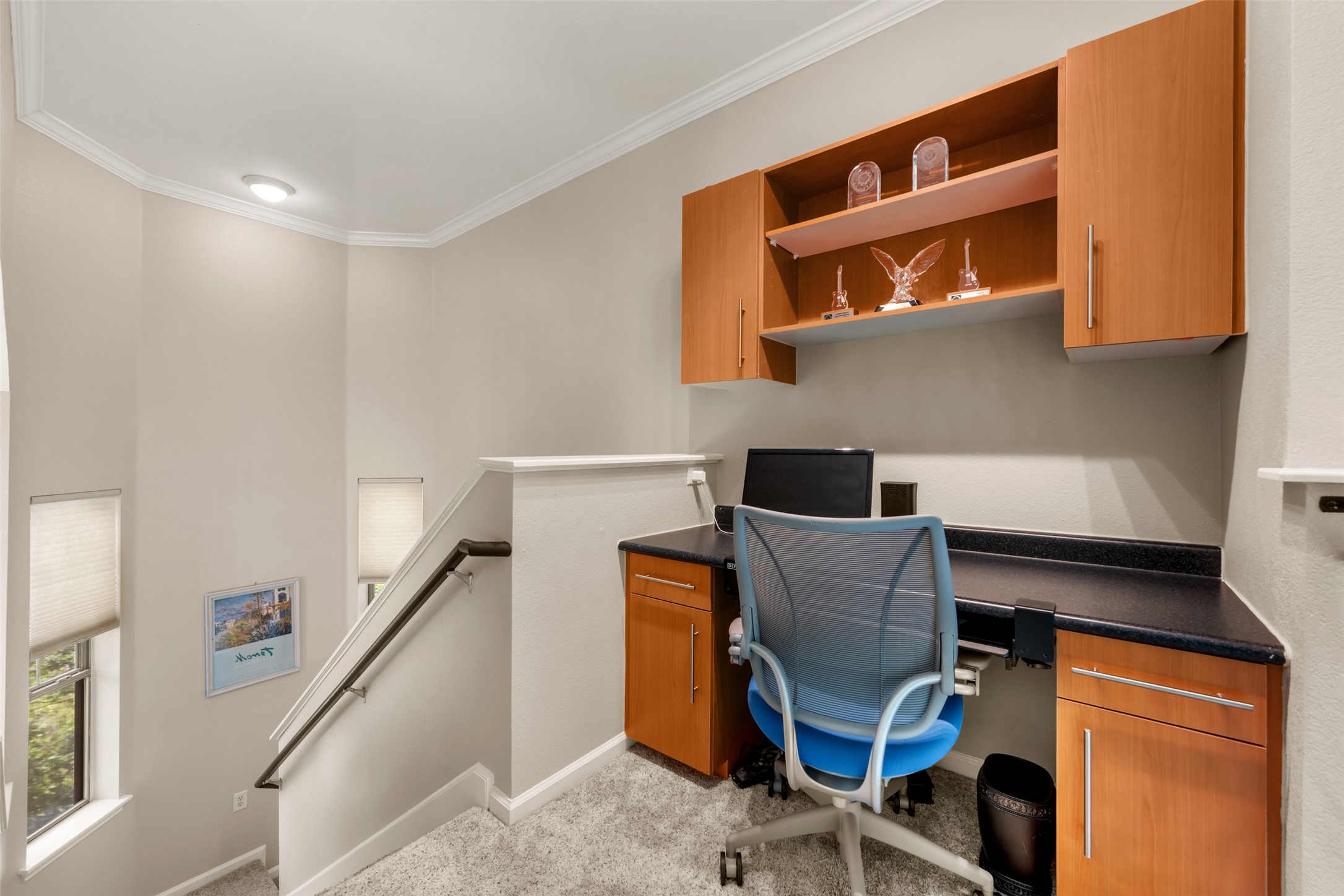 11203 Ranch Road 2222, Unit 1407 Austin, TX 78732 - Photo 35 of 40 At the top of the stairs on the third floor you will find a convenient built-in desk area.