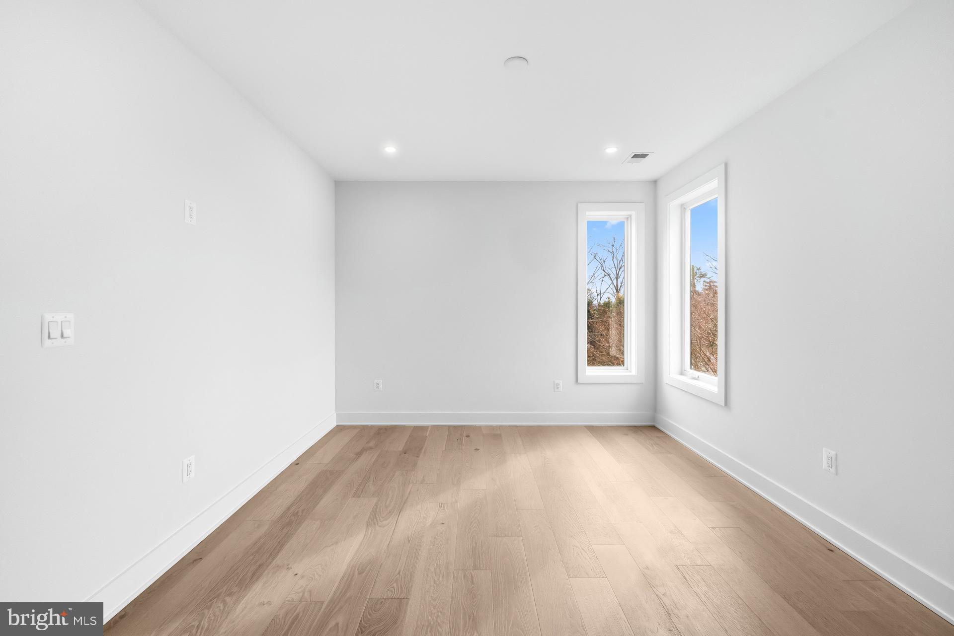 719 Meadow Lane Southwest Vienna, VA 22180 - Photo 102 of 118 a view of room with window and hardwood floor