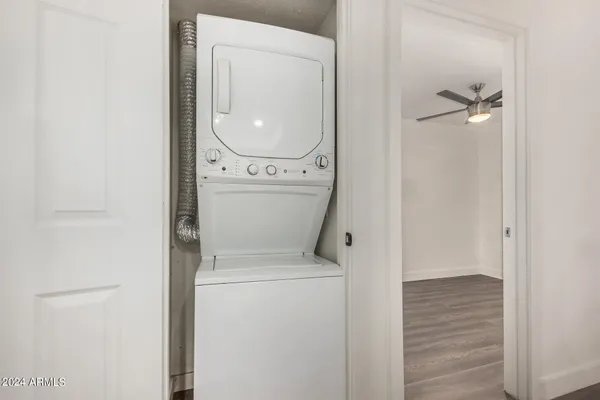 a view of bathroom with a toilet and a sink