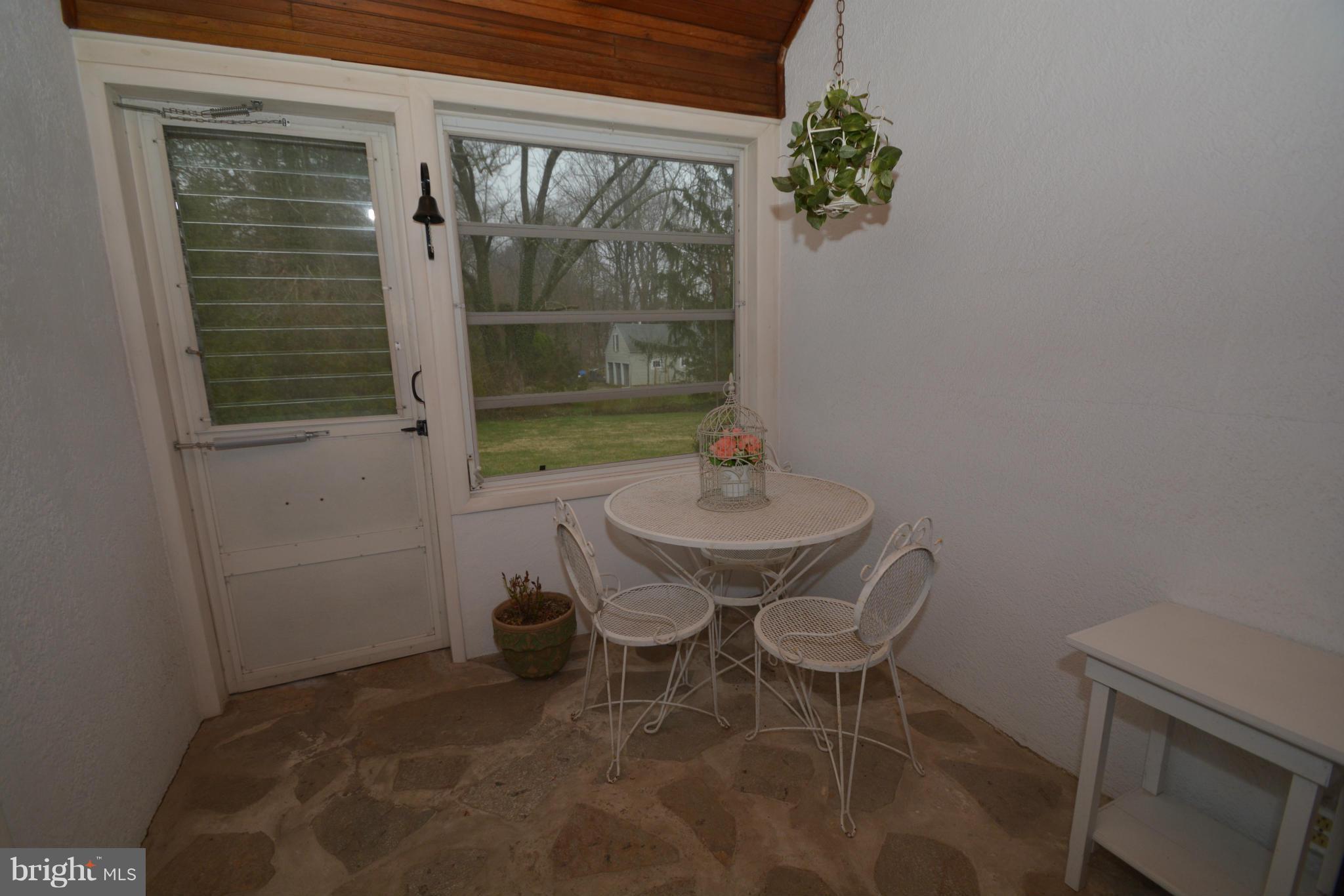 251 Gralan Road Baltimore, MD 21228 - Photo 18 of 24 Breezeway, great view of yard