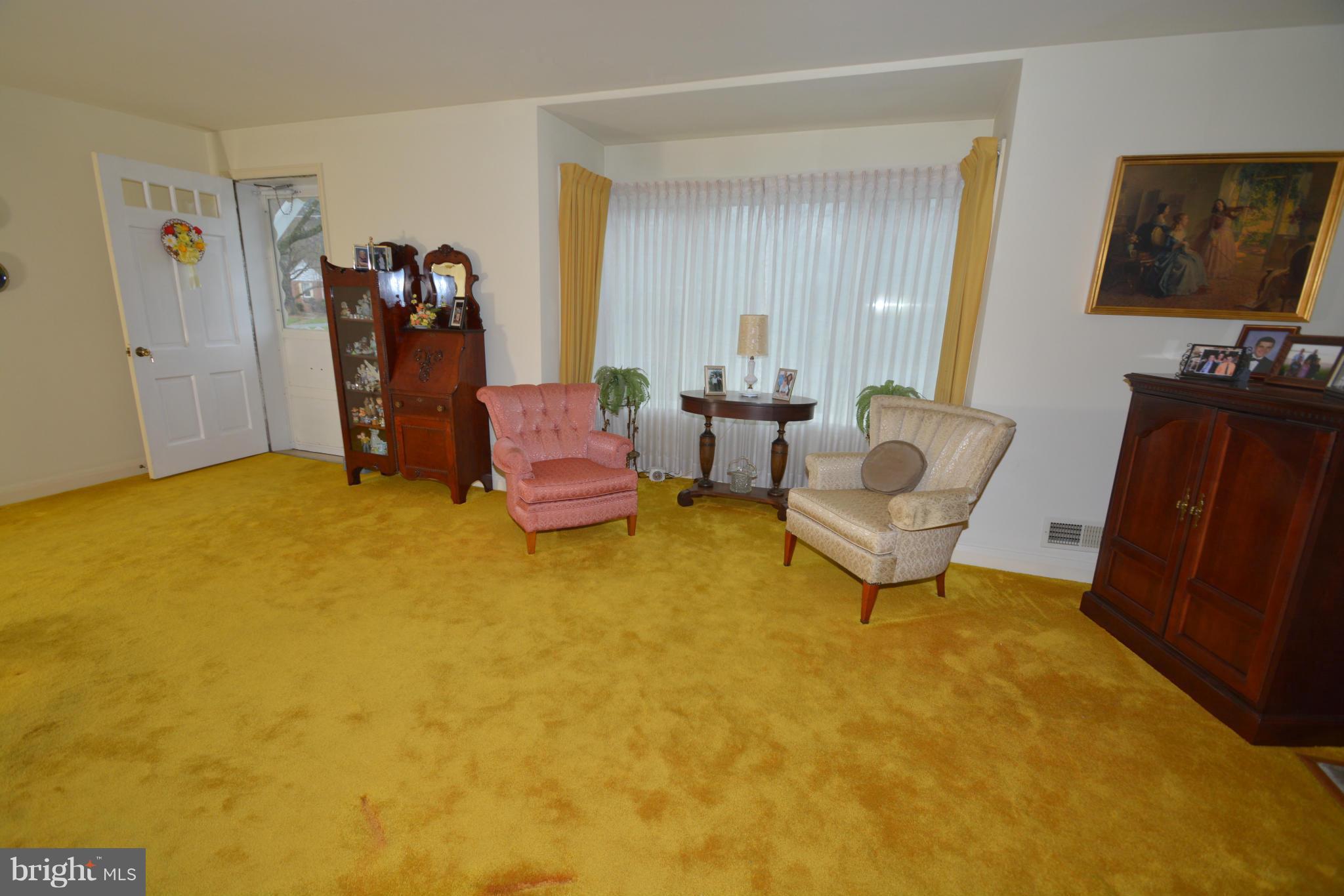 251 Gralan Road Baltimore, MD 21228 - Photo 6 of 24 hardwood flooring under carpet