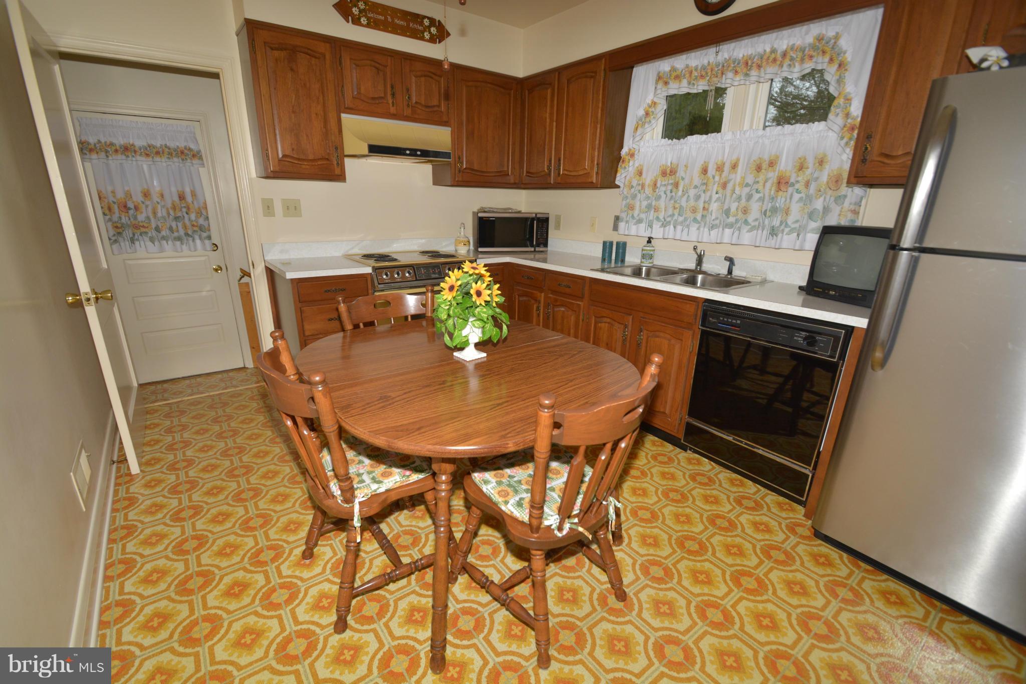 251 Gralan Road Baltimore, MD 21228 - Photo 10 of 24 Kitchen, stainless refrigerator