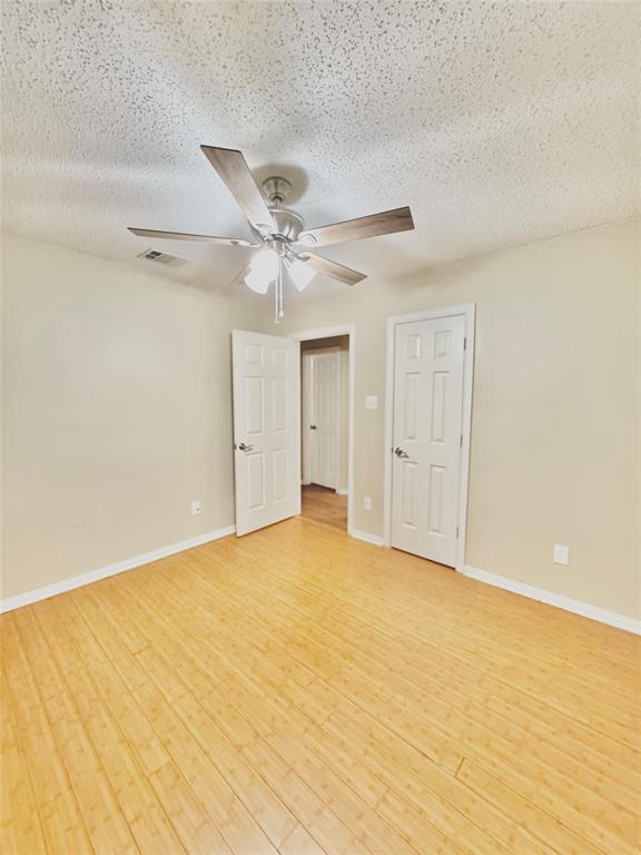 4005 Ridge Rock Drive Plano, TX 75074 - Photo 13 of 13 wooden floor in an empty room