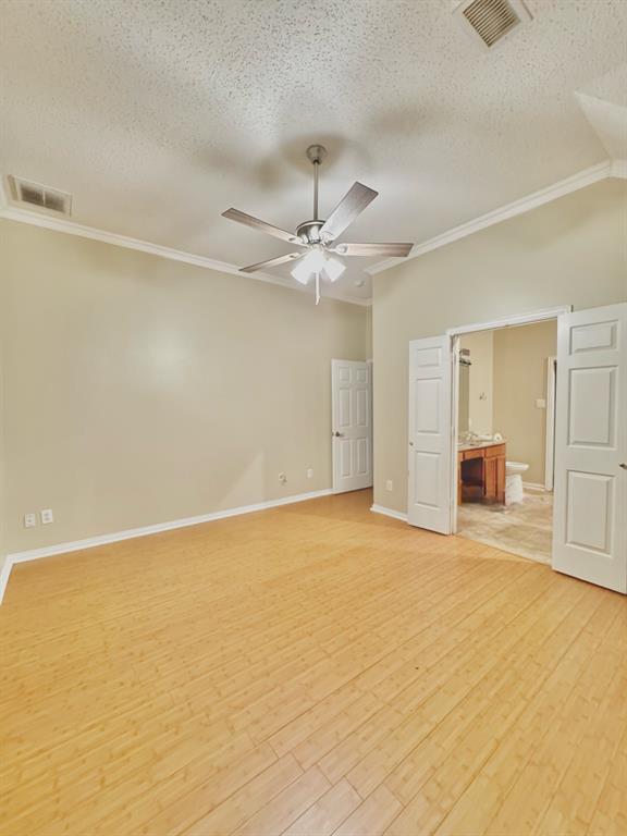 4005 Ridge Rock Drive Plano, TX 75074 - Photo 7 of 13 wooden floor in an empty room