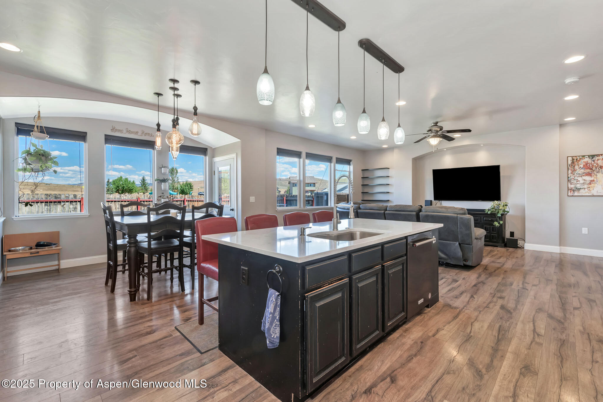875 Dry Creek Road Hayden, CO 81639 - Photo 11 of 40 a kitchen with a stove and a wooden floor