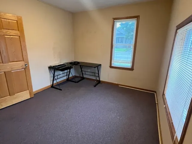 a view of hallway with stairs