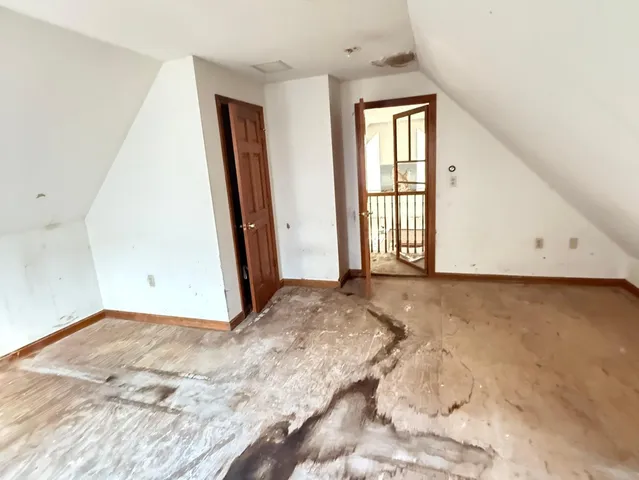 a view of a livingroom with wooden floor