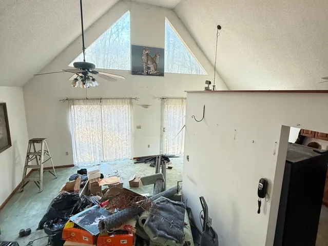 a room with table and chairs