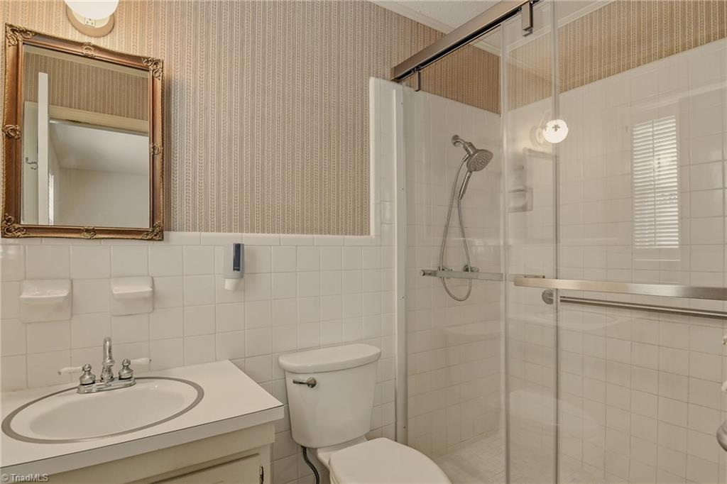 4325 Witherow Road Winston-Salem, NC 27106 - Photo 19 of 38 Full bath in primary bedroom - updated shower