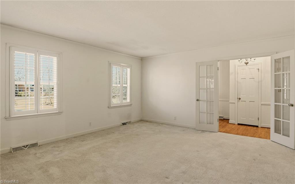 4325 Witherow Road Winston-Salem, NC 27106 - Photo 6 of 38 Large Living room with glass french doors
