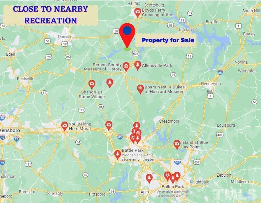 0 Woodsdale Road Roxboro, NC 27574 - Photo 4 of 16 a white wall with lots of items