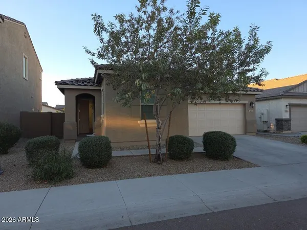 a front view of a house with patio