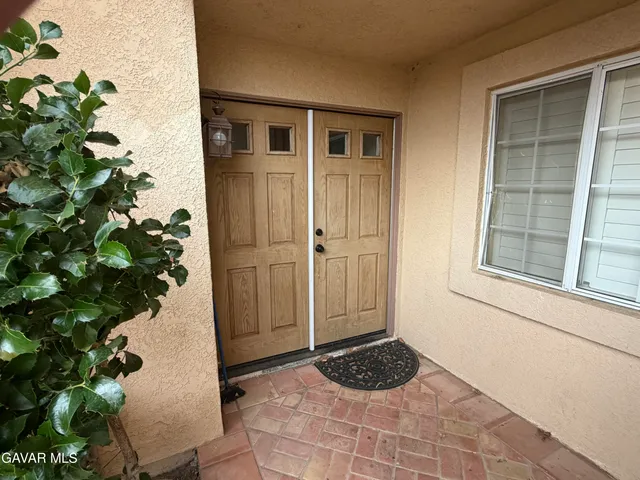 a bathroom with a toilet and shower