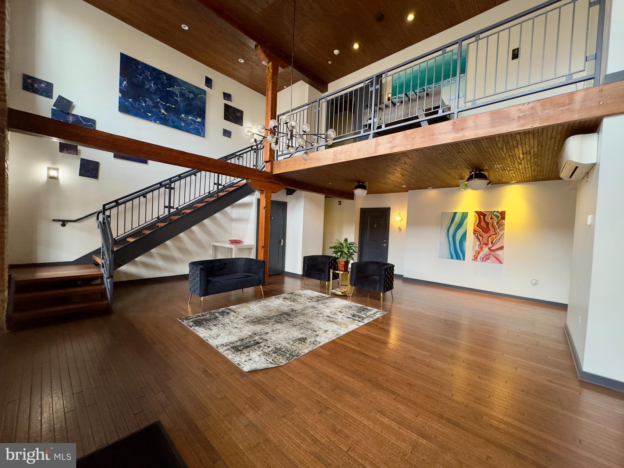 613 Portland Street, Unit 17 Baltimore, MD 21230 - Photo 2 of 12 a view of entryway and hall with wooden floor