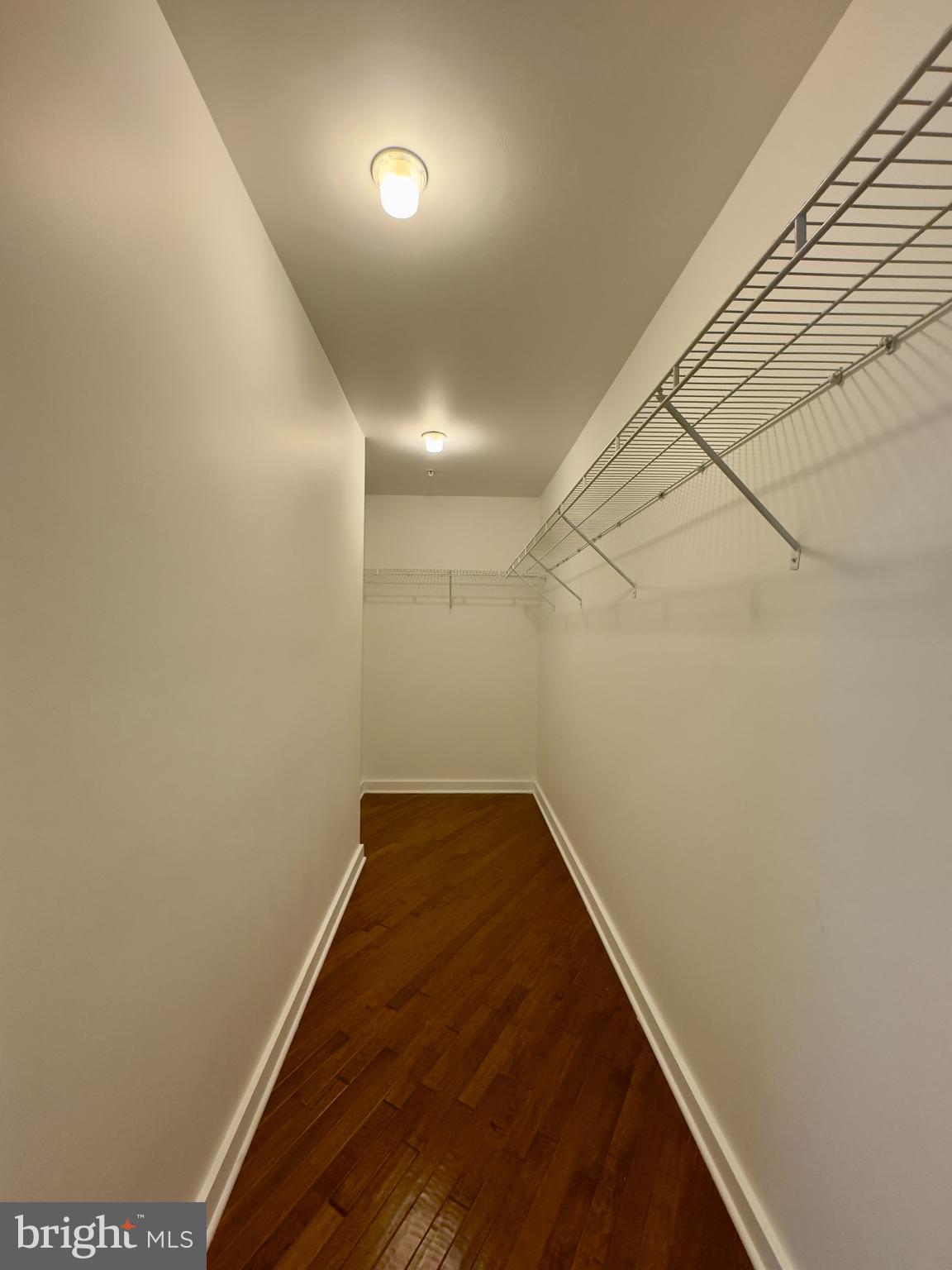 613 Portland Street, Unit 17 Baltimore, MD 21230 - Photo 10 of 12 a view of a hallway with empty room