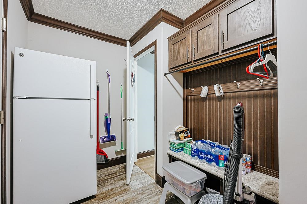 6773 Hampton Road Conway, SC 29527 - Photo 26 of 39 Mudroom with a textured ceiling, crown molding.