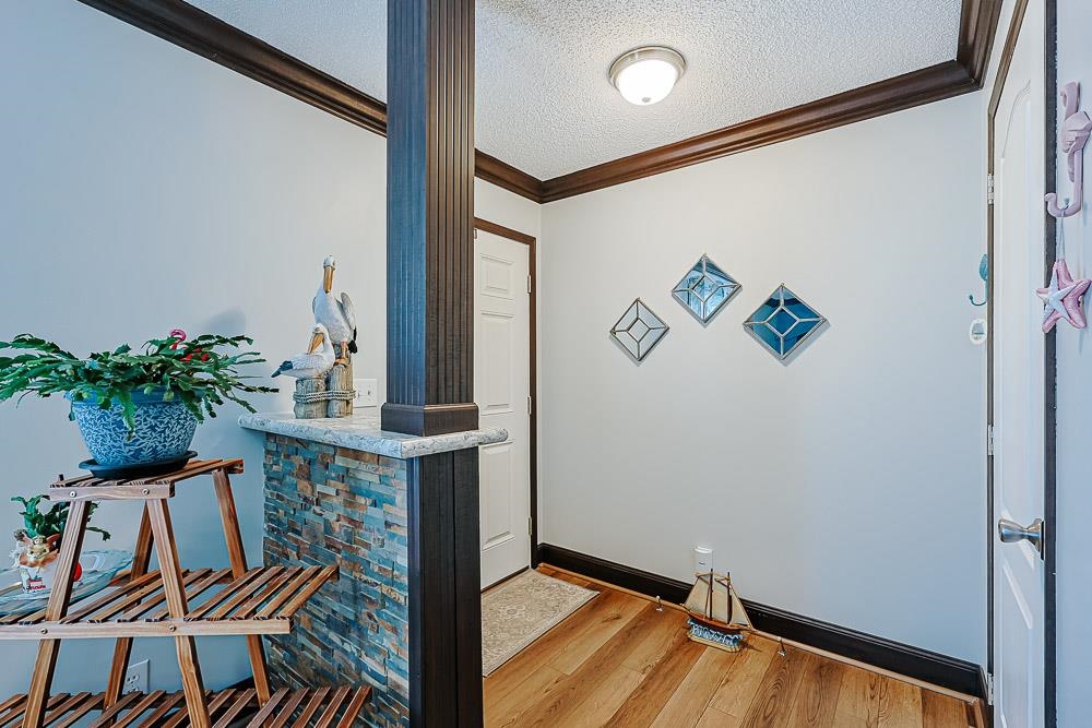 6773 Hampton Road Conway, SC 29527 - Photo 28 of 39 entry with a textured ceiling, and crown molding