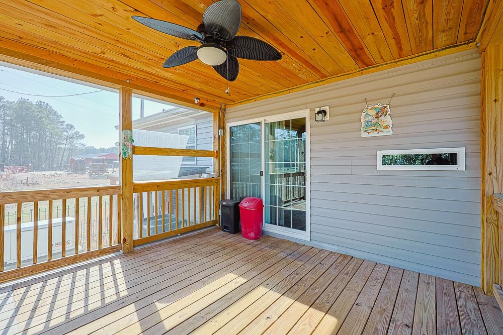 6773 Hampton Road Conway, SC 29527 - Photo 29 of 39 Screened in Porch featuring a ceiling fan and a sunroom