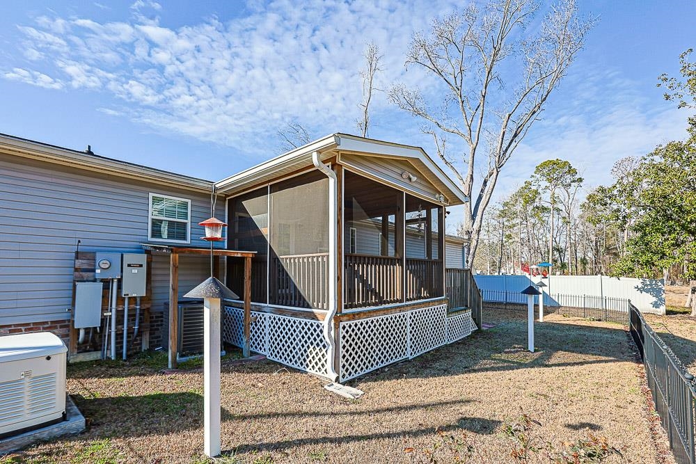 6773 Hampton Road Conway, SC 29527 - Photo 32 of 39 Back of house featuring a screened in porch